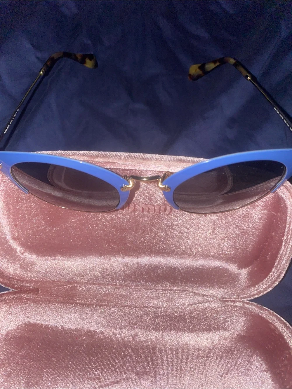 Authentic Miu Miu women’s Blue Round Metal-Trim Sunglasses